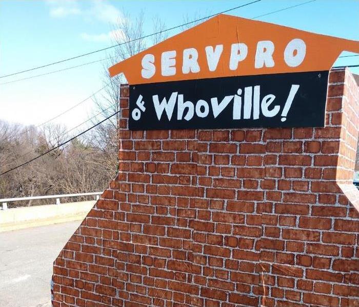 SERVPRO of Whoville sign attached to makeshift chimney underneath blue sky. 